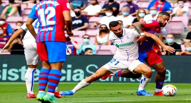 西甲比赛展开激烈较劲，呈现出精彩对决